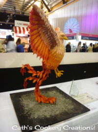 The side view of Vicky's cake showing just how the cake is balancing. Amazing! Cake, Bake and Sweets Show 2015 as seen by Cath's Cookery Creations! | www.cathscookerycreations.com